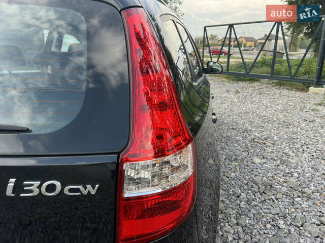 Чорний Хендай i30, об'ємом двигуна 1.4 л та пробігом 188 тис. км за 6850 $, фото 13 на Automoto.ua