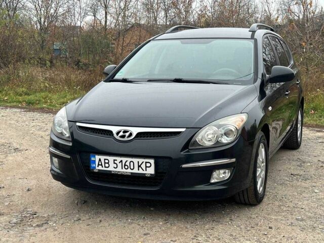 Черный Хендай i30, объемом двигателя 1.6 л и пробегом 265 тыс. км за 6200 $, фото 2 на Automoto.ua