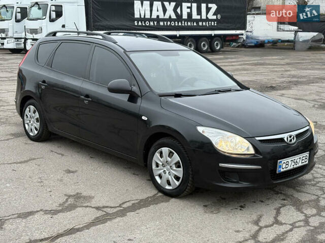 Черный Хендай i30, объемом двигателя 1.6 л и пробегом 265 тыс. км за 5900 $, фото 10 на Automoto.ua