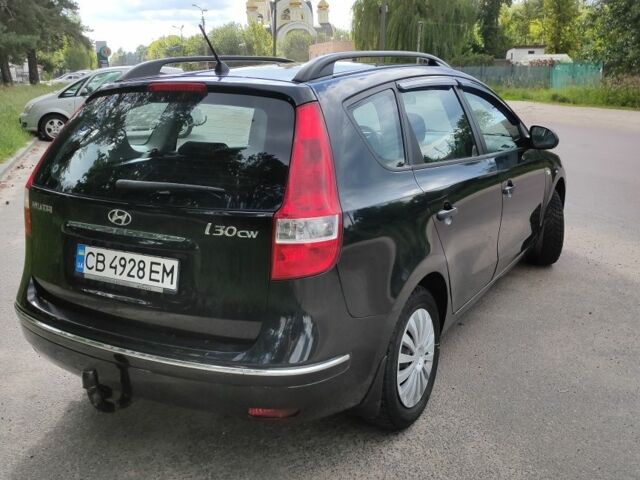 Черный Хендай i30, объемом двигателя 1.4 л и пробегом 220 тыс. км за 6100 $, фото 4 на Automoto.ua