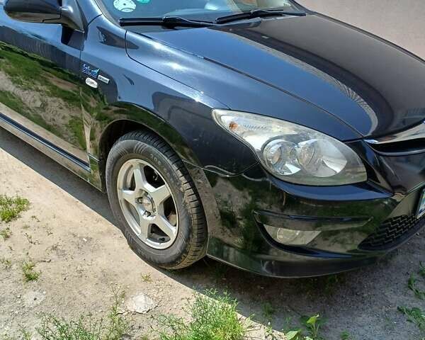 Черный Хендай i30, объемом двигателя 1.58 л и пробегом 330 тыс. км за 6100 $, фото 15 на Automoto.ua
