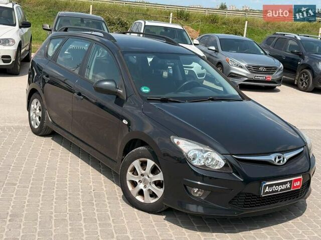Черный Хендай i30, объемом двигателя 1.4 л и пробегом 223 тыс. км за 5300 $, фото 3 на Automoto.ua