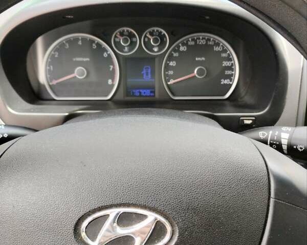 Чорний Хендай i30, об'ємом двигуна 1.4 л та пробігом 176 тис. км за 5700 $, фото 4 на Automoto.ua