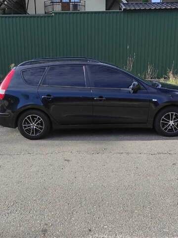 Черный Хендай i30, объемом двигателя 1.6 л и пробегом 241 тыс. км за 6400 $, фото 5 на Automoto.ua
