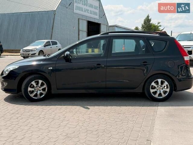 Черный Хендай i30, объемом двигателя 1.4 л и пробегом 223 тыс. км за 5300 $, фото 5 на Automoto.ua
