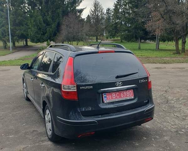 Чорний Хендай i30, об'ємом двигуна 1.4 л та пробігом 149 тис. км за 6100 $, фото 5 на Automoto.ua