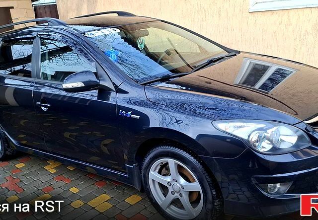 Черный Хендай i30, объемом двигателя 1.6 л и пробегом 212 тыс. км за 5800 $, фото 3 на Automoto.ua