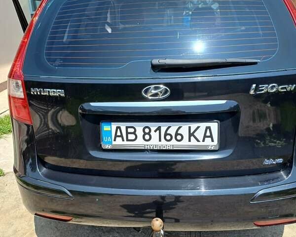 Черный Хендай i30, объемом двигателя 1.58 л и пробегом 330 тыс. км за 6100 $, фото 1 на Automoto.ua