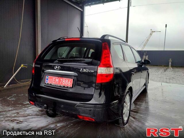 Черный Хендай i30, объемом двигателя 1.4 л и пробегом 135 тыс. км за 6500 $, фото 5 на Automoto.ua
