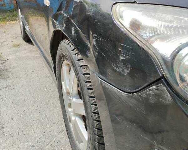 Чорний Хендай i30, об'ємом двигуна 1.4 л та пробігом 176 тис. км за 5700 $, фото 8 на Automoto.ua