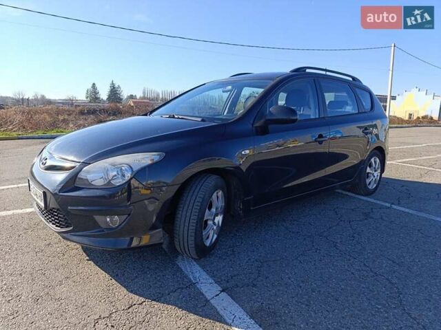 Черный Хендай i30, объемом двигателя 1.4 л и пробегом 237 тыс. км за 5600 $, фото 2 на Automoto.ua