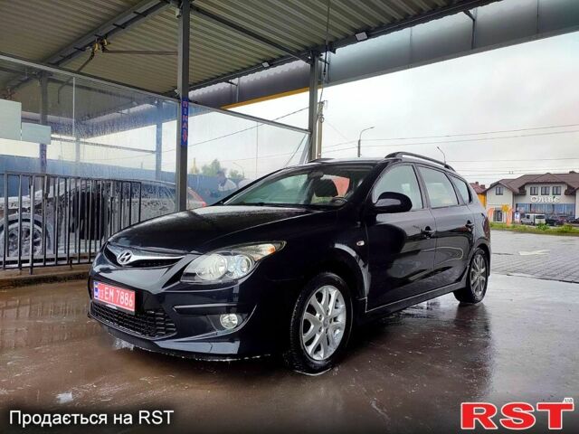 Черный Хендай i30, объемом двигателя 1.4 л и пробегом 135 тыс. км за 6500 $, фото 2 на Automoto.ua