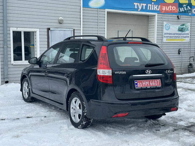 Черный Хендай i30, объемом двигателя 1.6 л и пробегом 204 тыс. км за 6600 $, фото 10 на Automoto.ua