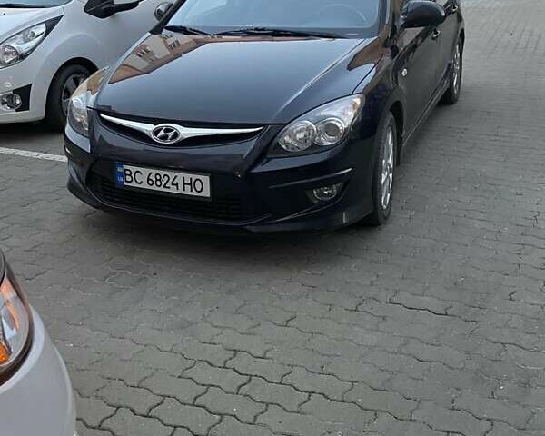 Черный Хендай i30, объемом двигателя 1.58 л и пробегом 190 тыс. км за 7100 $, фото 15 на Automoto.ua
