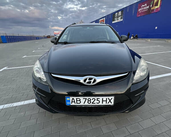 Черный Хендай i30, объемом двигателя 1.4 л и пробегом 230 тыс. км за 5000 $, фото 1 на Automoto.ua