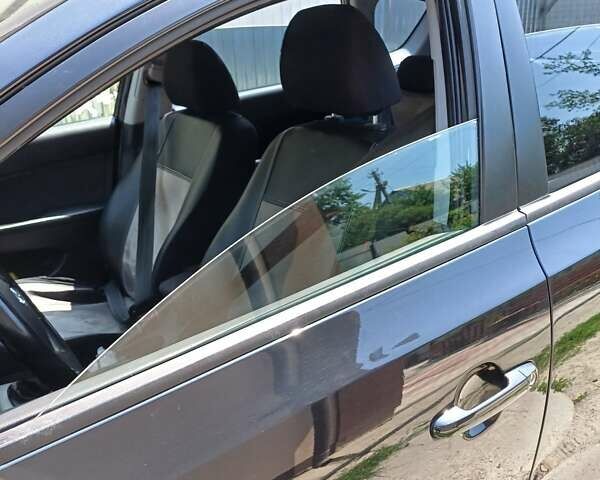 Черный Хендай i30, объемом двигателя 1.58 л и пробегом 330 тыс. км за 6100 $, фото 16 на Automoto.ua