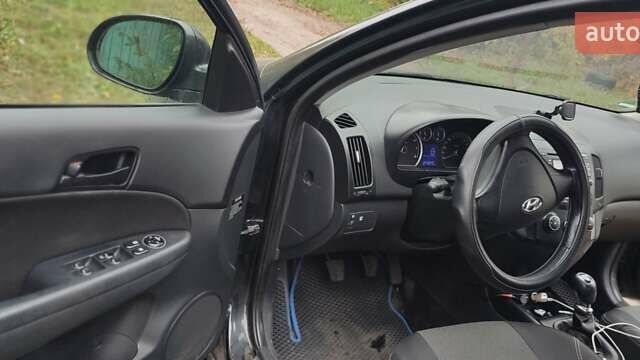 Черный Хендай i30, объемом двигателя 1.4 л и пробегом 216 тыс. км за 5650 $, фото 11 на Automoto.ua