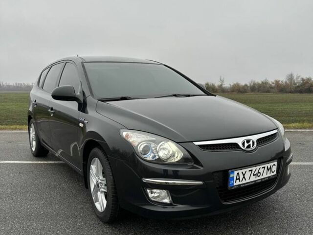 Черный Хендай i30, объемом двигателя 1.4 л и пробегом 190 тыс. км за 6700 $, фото 2 на Automoto.ua