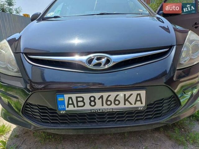 Черный Хендай i30, объемом двигателя 1.58 л и пробегом 330 тыс. км за 6100 $, фото 4 на Automoto.ua