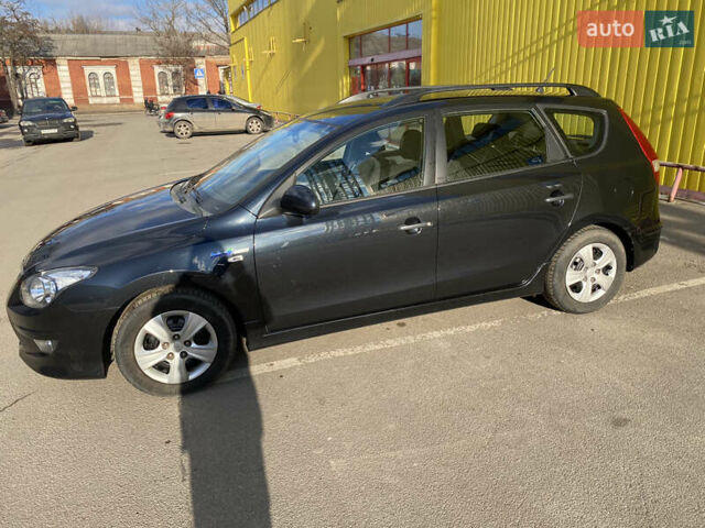Черный Хендай i30, объемом двигателя 1.4 л и пробегом 187 тыс. км за 6850 $, фото 1 на Automoto.ua