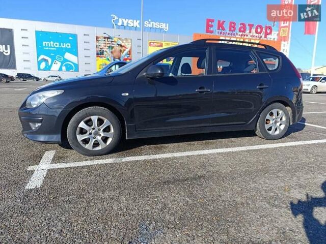Черный Хендай i30, объемом двигателя 1.4 л и пробегом 237 тыс. км за 5600 $, фото 3 на Automoto.ua