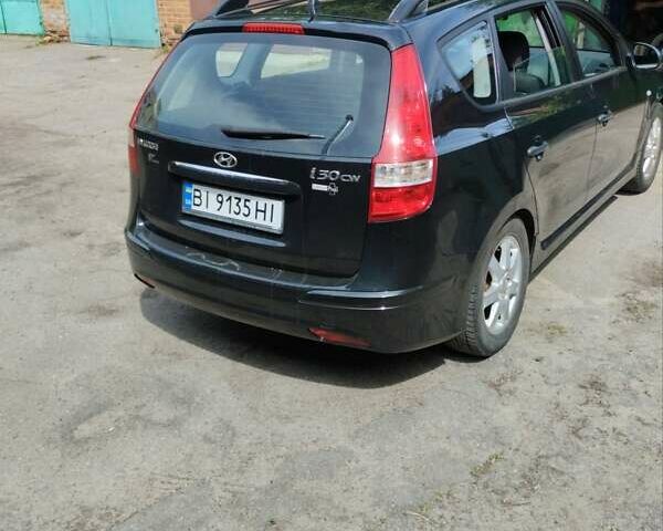 Чорний Хендай i30, об'ємом двигуна 1.4 л та пробігом 176 тис. км за 5700 $, фото 5 на Automoto.ua