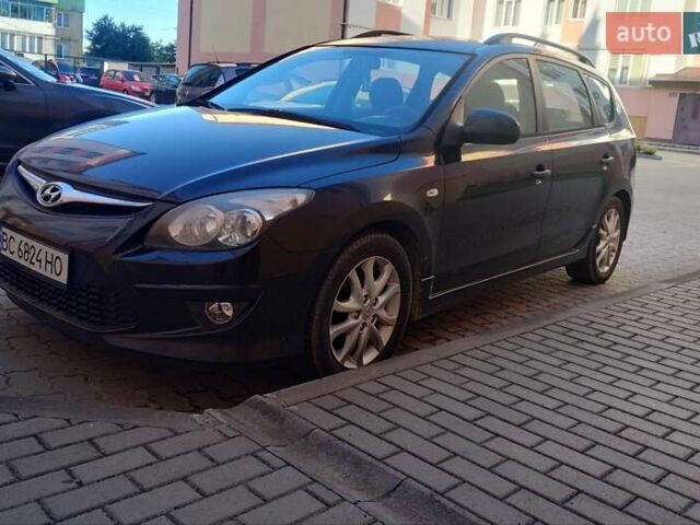 Черный Хендай i30, объемом двигателя 1.58 л и пробегом 190 тыс. км за 7100 $, фото 7 на Automoto.ua