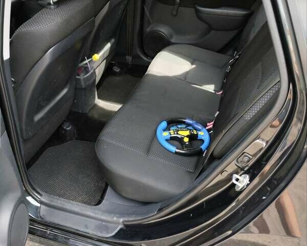 Чорний Хендай i30, об'ємом двигуна 1.4 л та пробігом 176 тис. км за 5700 $, фото 3 на Automoto.ua