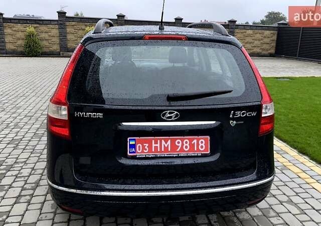 Черный Хендай i30, объемом двигателя 1.4 л и пробегом 145 тыс. км за 5999 $, фото 5 на Automoto.ua