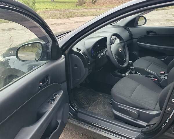 Чорний Хендай i30, об'ємом двигуна 1.4 л та пробігом 149 тис. км за 6100 $, фото 20 на Automoto.ua