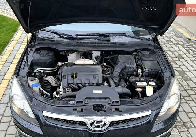 Черный Хендай i30, объемом двигателя 1.4 л и пробегом 145 тыс. км за 5999 $, фото 18 на Automoto.ua