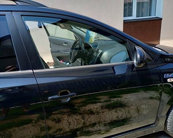 Черный Хендай i30, объемом двигателя 1.58 л и пробегом 330 тыс. км за 6100 $, фото 3 на Automoto.ua