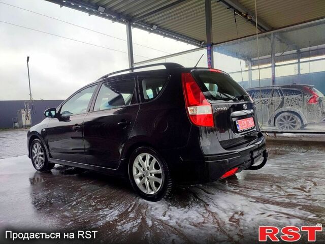 Черный Хендай i30, объемом двигателя 1.4 л и пробегом 135 тыс. км за 6500 $, фото 8 на Automoto.ua