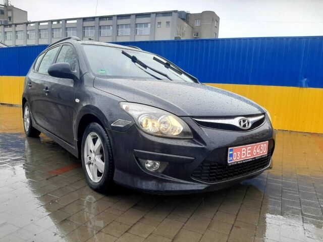 Черный Хендай i30, объемом двигателя 1.6 л и пробегом 219 тыс. км за 6300 $, фото 1 на Automoto.ua