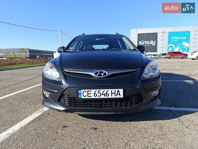 Черный Хендай i30, объемом двигателя 1.4 л и пробегом 237 тыс. км за 5600 $, фото 1 на Automoto.ua