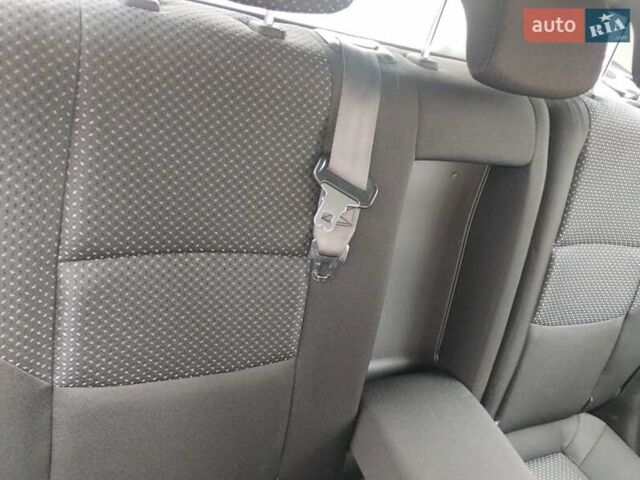 Черный Хендай i30, объемом двигателя 1.58 л и пробегом 190 тыс. км за 7100 $, фото 9 на Automoto.ua