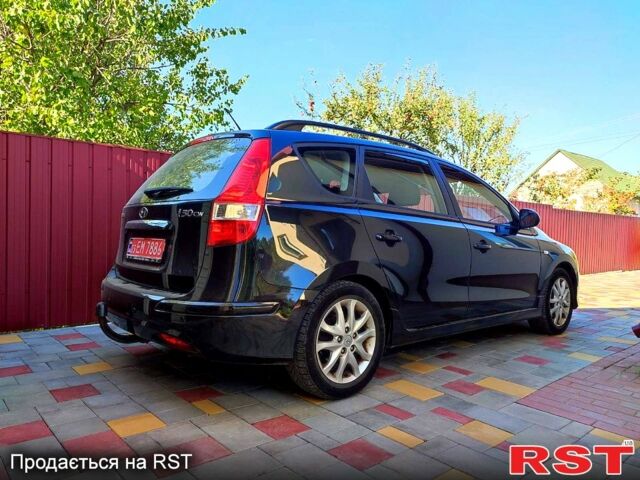 Черный Хендай i30, объемом двигателя 1.4 л и пробегом 135 тыс. км за 6500 $, фото 1 на Automoto.ua