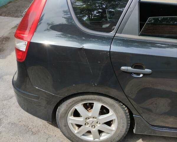 Чорний Хендай i30, об'ємом двигуна 1.4 л та пробігом 176 тис. км за 5700 $, фото 2 на Automoto.ua