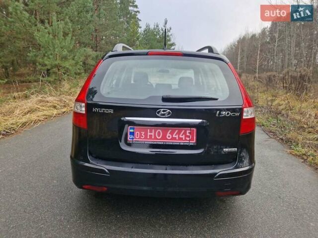 Черный Хендай i30, объемом двигателя 1.6 л и пробегом 232 тыс. км за 7000 $, фото 8 на Automoto.ua