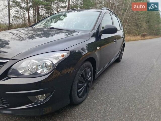 Черный Хендай i30, объемом двигателя 1.6 л и пробегом 232 тыс. км за 7000 $, фото 2 на Automoto.ua