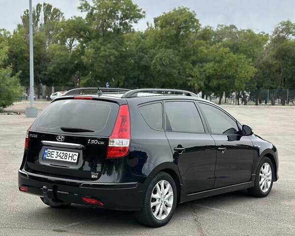 Черный Хендай i30, объемом двигателя 1.4 л и пробегом 137 тыс. км за 7500 $, фото 12 на Automoto.ua