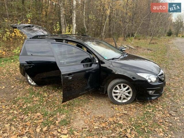 Черный Хендай i30, объемом двигателя 1.58 л и пробегом 235 тыс. км за 6700 $, фото 11 на Automoto.ua