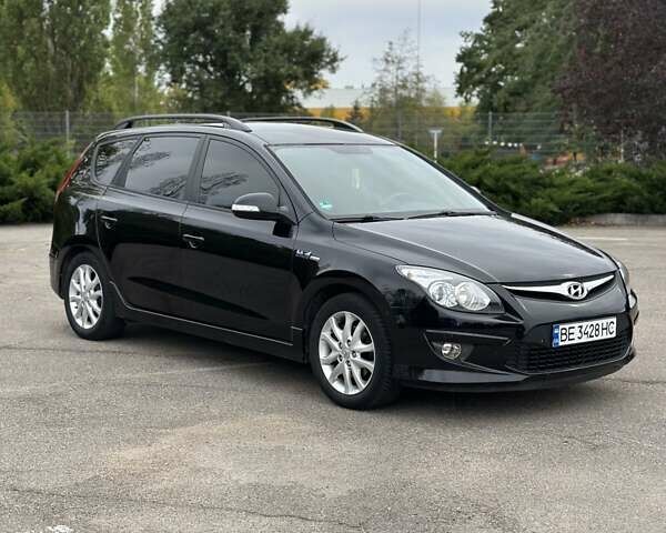 Черный Хендай i30, объемом двигателя 1.4 л и пробегом 137 тыс. км за 7500 $, фото 18 на Automoto.ua
