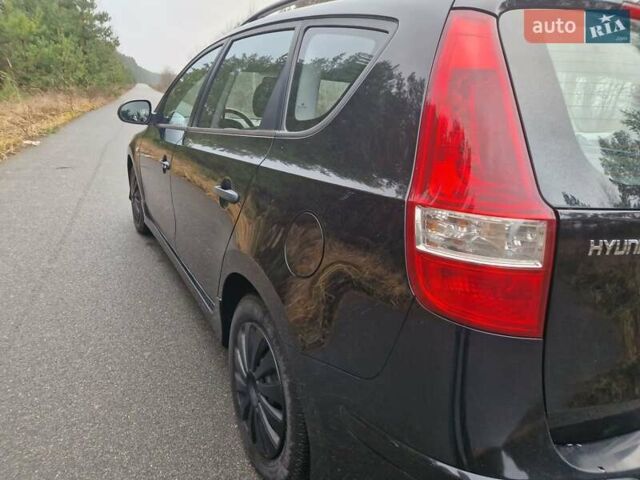 Черный Хендай i30, объемом двигателя 1.6 л и пробегом 232 тыс. км за 7000 $, фото 10 на Automoto.ua