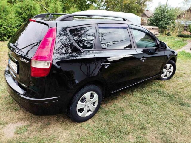 Черный Хендай i30, объемом двигателя 1.6 л и пробегом 180 тыс. км за 6700 $, фото 6 на Automoto.ua