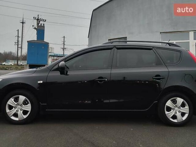 Черный Хендай i30, объемом двигателя 1.59 л и пробегом 72 тыс. км за 8500 $, фото 2 на Automoto.ua
