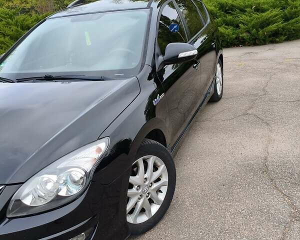 Черный Хендай i30, объемом двигателя 1.4 л и пробегом 137 тыс. км за 7500 $, фото 8 на Automoto.ua