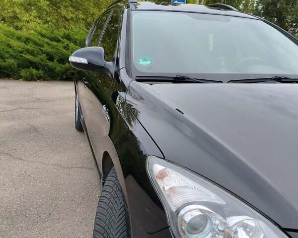 Черный Хендай i30, объемом двигателя 1.4 л и пробегом 137 тыс. км за 7500 $, фото 5 на Automoto.ua