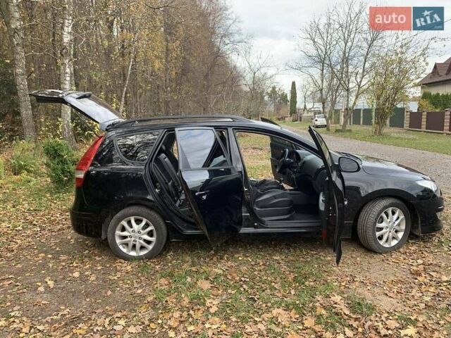 Черный Хендай i30, объемом двигателя 1.58 л и пробегом 235 тыс. км за 6700 $, фото 10 на Automoto.ua