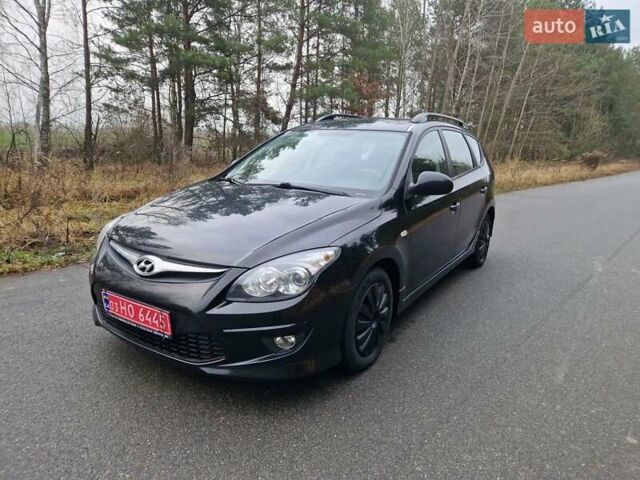 Черный Хендай i30, объемом двигателя 1.6 л и пробегом 232 тыс. км за 7000 $, фото 1 на Automoto.ua